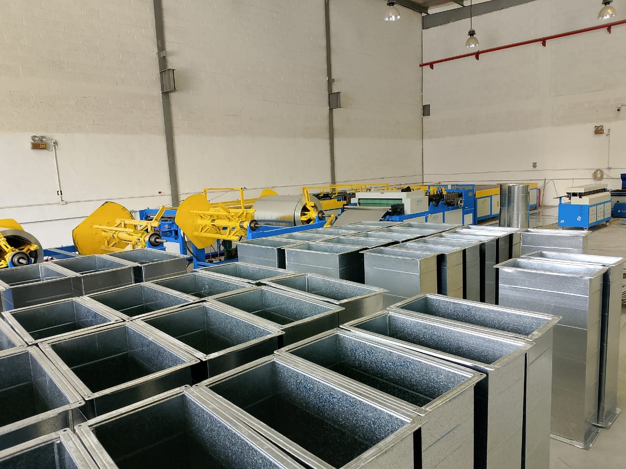 Duct production line and finished TDF ducts in the Hadaf Dhahran workshop
